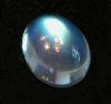 RAINBOW MOONSTONE CABOCHON (India) � 10 x 8 mm. Oval